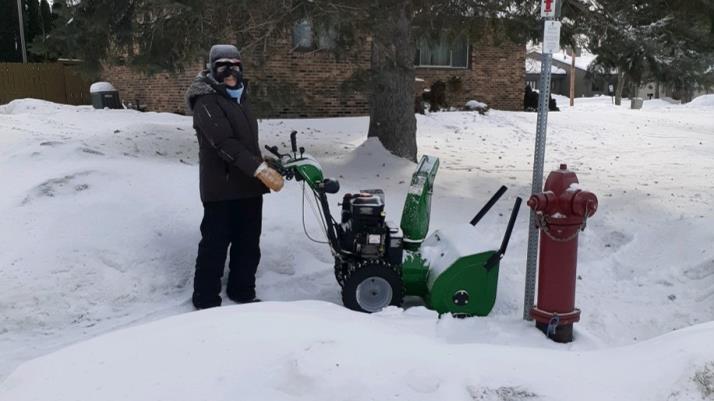 Mary Arnholt with snowblower